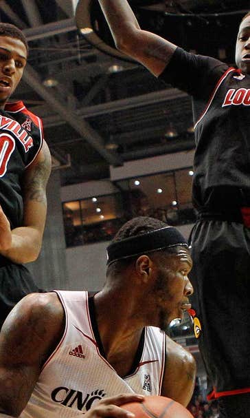 No. 11 Louisville beats No. 7 Cincinnati 58-57